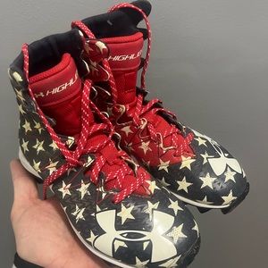 UA youth football cleats
